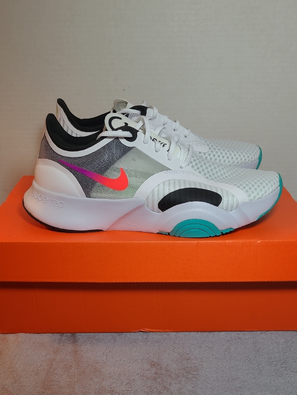 NIKE Womens SUPERREP GO White Sneakers with Pink/Red Swoosh & Teal Accents